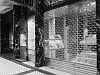 Goods are securely on display at this shopfront.