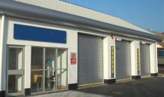 Industrial shutters are typically operated by a hand held chain or a externally fitted block motor. An industrial roller shutter.