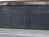 Shopfront viewguard roller shutter in daylight