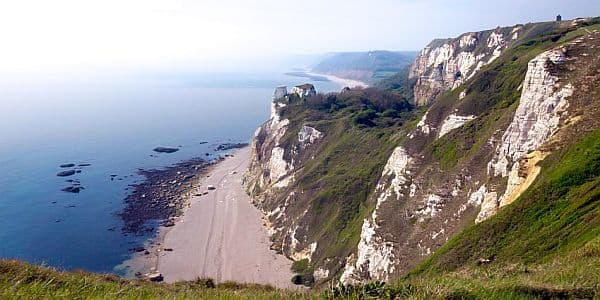 View from steep cliffs across the English Channel and the beach between Branscombe and Beer in Devon