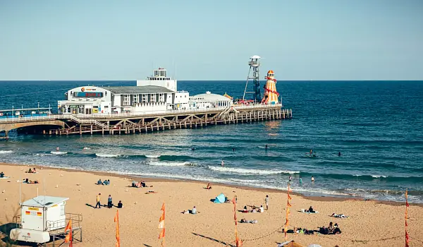 Bournemouth pier stretching out from the beach into sea