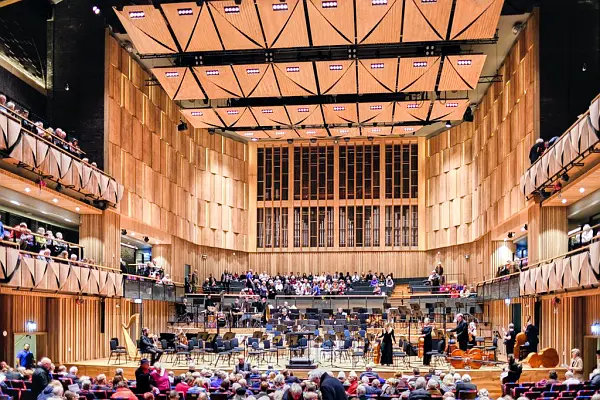orchestra about to play and perform in Bristol Beacon Concert hall