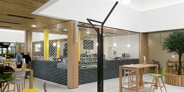 Chainlink roller shutters at right angles to each other