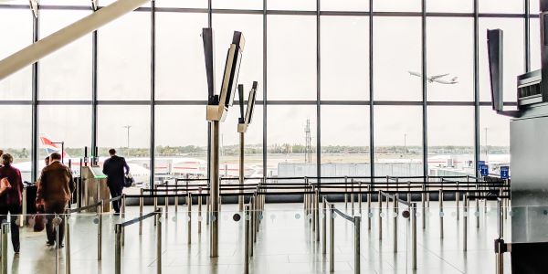 passengers walking around at Heathrow Airport