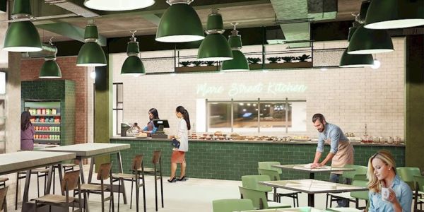 People in restaurant with servery area