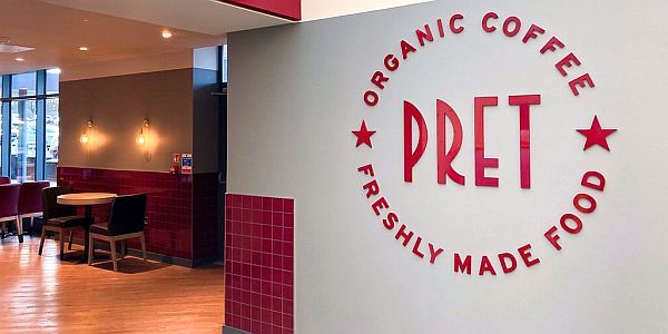 Pret a Manger logo at a wall inside the Exeter M5 Moto Services