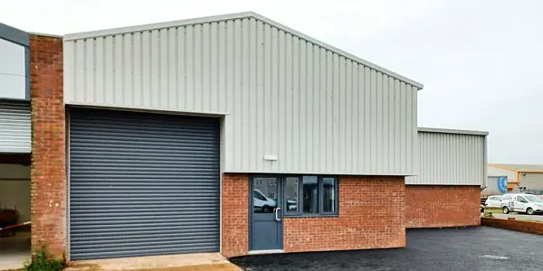 Insulated industrial roller shutter at a goods entrance of a warehouse