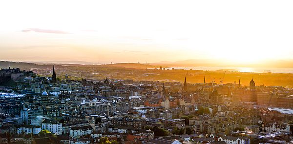 panoramic view at sunset across the city of Edinburgh in Scotland