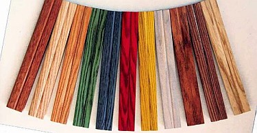 Samples of wooden roller shutter lath stained in different colours.