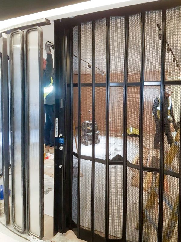 Flexiglide vision air security shutter being installed