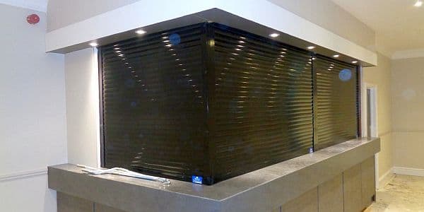 Set of roller shutters on a reception desk
