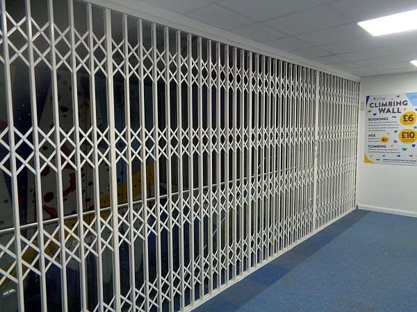 A white sliding security grille